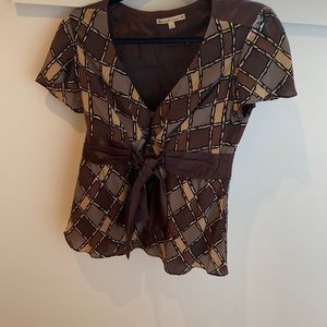 Never worn Nanette Laporte silk blouse buttons and bow in front